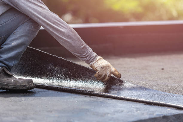 Professional Waterproofing technician working in Quincy, MI